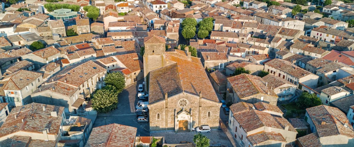 aerial-top-view-bram-medieval-village-architecture-roofs-from-southern-france